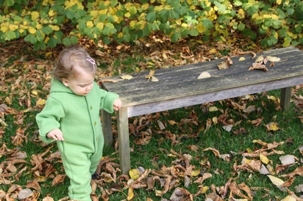 Kind im Bio Schurwoll Overall von Disana in Grün Kind im Bio Schurwoll Overall von Disana in Grün