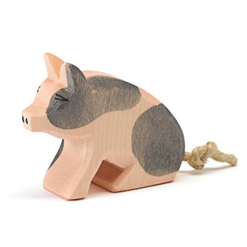 Ferkel gefleckt Holzfigur sitzend 4,5 cm hoch