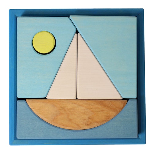 Bauspiel blau 7 Teile im Rahmen 18,6 x 18,6 cm