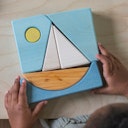 Vorschaubild Bauspiel blau 7 Teile im Rahmen 18,6 x 18,6 cm