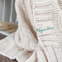 Vorschaubild Edle Babydecke gestrickt natur Biobaumwolle 80 x 100 cm