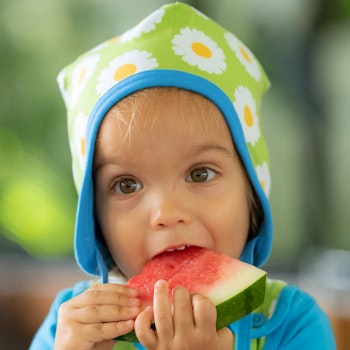 Mütze Ohrenschutz Gänseblümchen grün