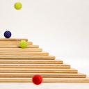 Vorschaubild 35 kleine Murmeln Holzkugeln bunt, mit Beutel