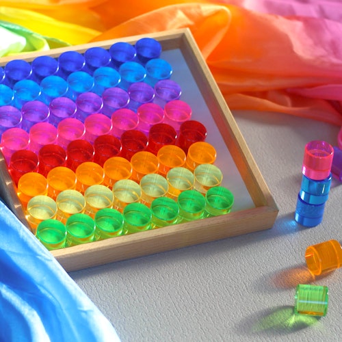 64 Lichtbauzylinder im Holzrahmen 21x21 cm