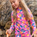 Vorschaubild Langarmshirt mit Shorts Orangen-Motive