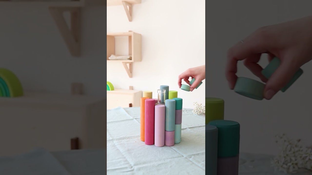 Steckspiel Kleine Walzen Pastell, 12 Teile inkl Sortierbrett